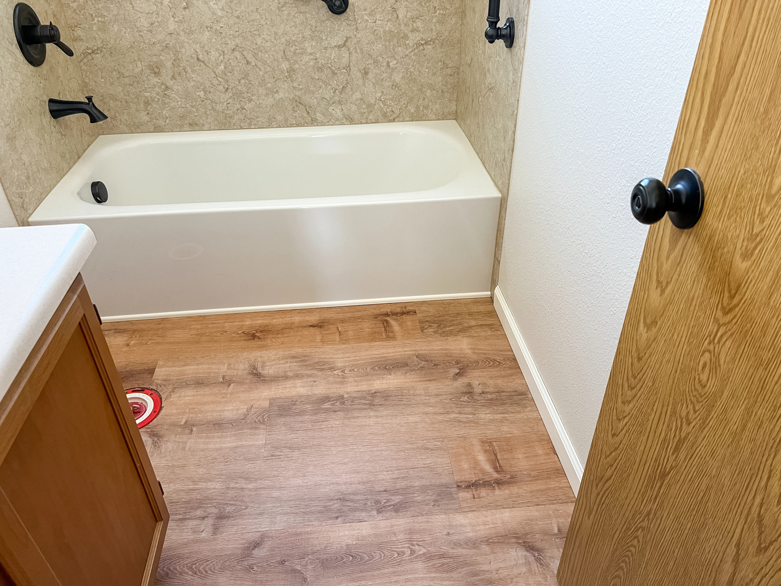 bathroom with vinyl floor